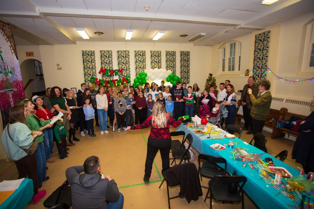 Families and volunteers at a Creative Inclusion community gathering
